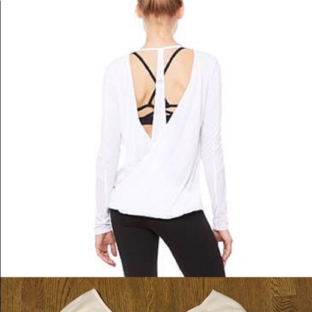 Ali white top with tags